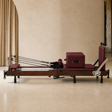 Sienna Folding Reformer 2.0 Walnut in Burgundy