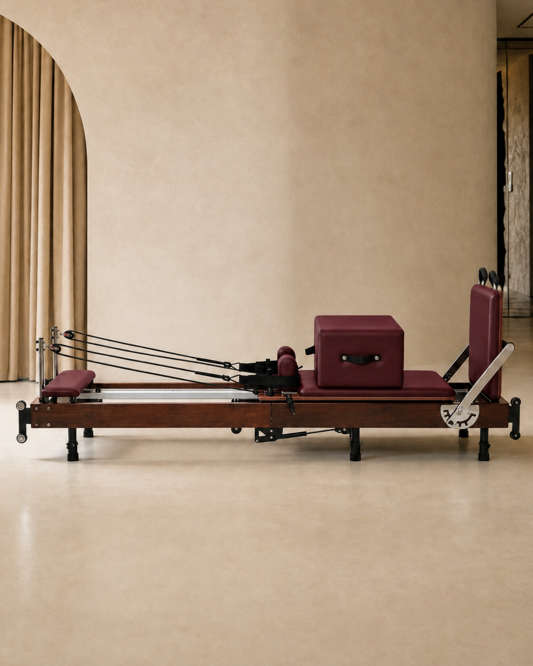 Sienna Folding Reformer 2.0 Walnut in Burgundy